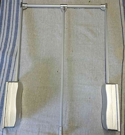 Складная система вешалок для гардероба Малацки - изображение 1