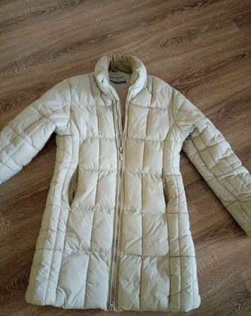 Женская зимняя куртка бежевого цвета Кошице - изображение 1